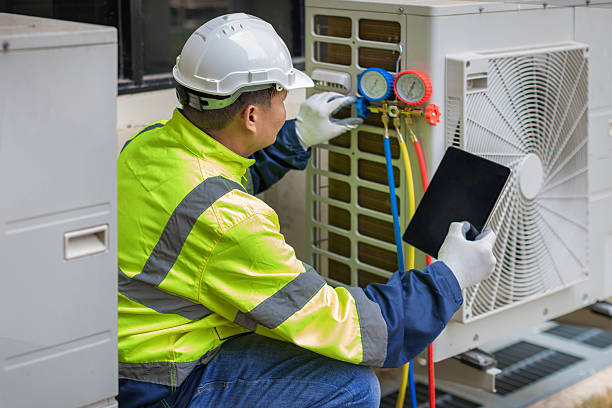 Professional Air Duct Cleaning technician working in Russellville, KY